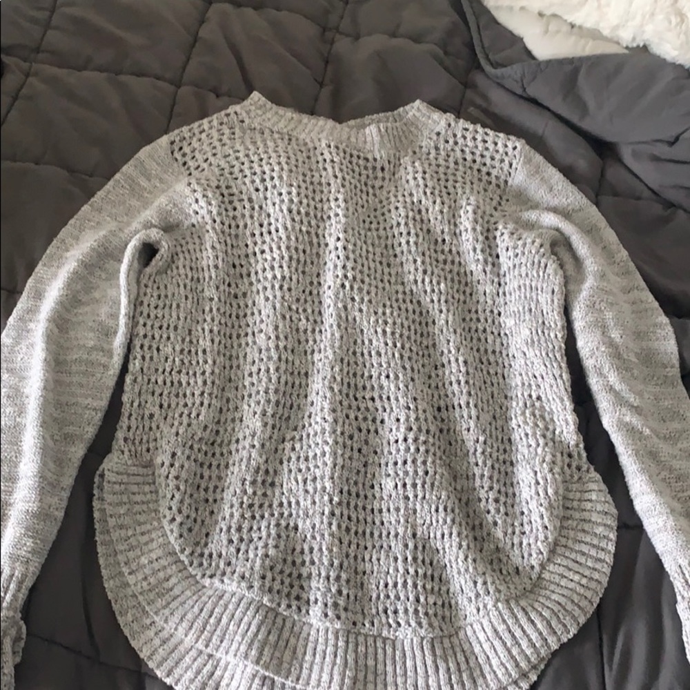 White with black pull over sweater